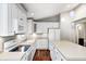 Stylish kitchen with white cabinets, modern appliances, island and hardwood floors at 901 W 250 N, Lebanon, IN 46052