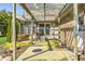 Home patio with arbor, hanging basket, and brick siding at 901 W 250 N, Lebanon, IN 46052
