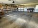 Spacious garage featuring open shelving and ample room for parking and storage at 901 W 250 N, Lebanon, IN 46052