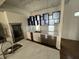 Modern kitchen featuring stainless steel appliances and stylish white cabinets at 902 N Broadway St, Indianapolis, IN 46202