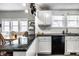 Kitchen and eating area featuring granite counters and modern appliances at 902 Villa Ave, Indianapolis, IN 46203