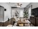 Living room with hardwood floors, neutral decor, and modern entertainment center at 902 Villa Ave, Indianapolis, IN 46203
