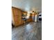 Well-appointed kitchen with stainless steel appliances and wood-look tile flooring at 9235 Thrushwood Ln, Indianapolis, IN 46250