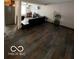 Cozy living room showcasing wood flooring and comfortable seating at 9235 Thrushwood Ln, Indianapolis, IN 46250
