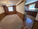 Dining room with built-in cabinets, decorative trim, and connecting to the kitchen area at 930 Charlene Ln, Anderson, IN 46011
