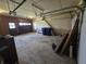 Spacious garage with two doors, shelving, and room for storage and vehicle parking at 930 Charlene Ln, Anderson, IN 46011