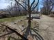 The front yard is landscaped with a small brick wall and a small amount of vegetation at 930 Charlene Ln, Anderson, IN 46011
