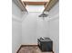 An empty closet with an open safe at the bottom at 9406 Northeastern Ave, Indianapolis, IN 46239