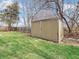 Large shed in a well-maintained backyard, providing extra storage space for tools and equipment at 9406 Northeastern Ave, Indianapolis, IN 46239