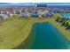 Overhead view of the property at 1043 Palomar Dr. next to a pond and neighborhood at 1043 Palomar Dr, Westfield, IN 46074