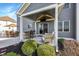 Outdoor back patio including bar seating, a covered outdoor television, and an eating area at 1043 Palomar Dr, Westfield, IN 46074
