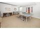 Recreational basement area with a game table, desk area, and wall decor, perfect for entertainment at 1043 Palomar Dr, Westfield, IN 46074