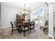 Dining room features a large window with a window seat and modern chandelier at 1043 Palomar Dr, Westfield, IN 46074