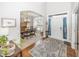 Bright and airy foyer with hardwood floors and a view into the dining room at 1043 Palomar Dr, Westfield, IN 46074