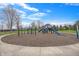 Community playground with slides, climbing structures, and benches for relaxation under a sunny sky at 1043 Palomar Dr, Westfield, IN 46074