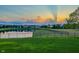 Beautiful pond view with sunset and sunlight rays shining over the homes in the neighborhood at 1043 Palomar Dr, Westfield, IN 46074