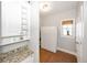 Neutral storage area with natural light and wood floors at 1043 Palomar Dr, Westfield, IN 46074