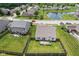 Aerial view of backyard, deck, and neighborhood pond adds beauty to the community at 10522 Hunters Crossing Blvd, Indianapolis, IN 46239