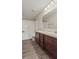 Bathroom with double sink vanity, granite countertop, framed mirror, and tiled shower/tub combo at 10522 Hunters Crossing Blvd, Indianapolis, IN 46239