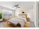 Bright bedroom with modern decor, ceiling fan, and comfortable furnishings at 10522 Hunters Crossing Blvd, Indianapolis, IN 46239