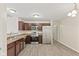 Well-equipped kitchen with stainless steel appliances, ample counter space, and wood cabinets at 10522 Hunters Crossing Blvd, Indianapolis, IN 46239