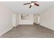 Open-concept living room offers plenty of natural light and a view into the kitchen at 10522 Hunters Crossing Blvd, Indianapolis, IN 46239