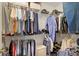 Spacious walk-in closet with ample shelving and organized storage for clothes and accessories at 10629 Medinah Dr # 1, Indianapolis, IN 46234