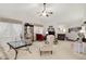 Large and open living room with high vaulted ceilings, neutral colors, and a gas fireplace at 10629 Medinah Dr # 1, Indianapolis, IN 46234