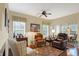 This living room is spacious and bright with access to the kitchen and breakfast nook at 10629 Medinah Dr # 1, Indianapolis, IN 46234