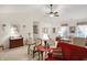 Bright living room with vaulted ceilings, neutral carpet, and comfortable furniture at 10629 Medinah Dr # 1, Indianapolis, IN 46234