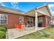 An inviting outdoor patio featuring modern patio furniture on a concrete slab and an open roof at 10629 Medinah Dr # 1, Indianapolis, IN 46234