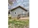 Backyard featuring a wooden deck and green grass at 1100 Graham St, Franklin, IN 46131