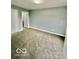 Bedroom featuring carpeted floor and neutral-toned walls at 1100 Graham St, Franklin, IN 46131