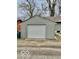 A detached garage with a white door, offering secure parking at 1100 Graham St, Franklin, IN 46131
