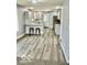 Bright kitchen featuring gray cabinets, breakfast bar, and stainless steel appliances at 1100 Graham St, Franklin, IN 46131