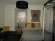 Cozy bedroom featuring a comfortable bed, modern lamp, and decorative artwork at 1153 W 29Th St, Indianapolis, IN 46208