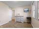 Bright bedroom with dresser, mounted TV and large window allowing lots of natural light at 1160 Ida Ct, Greenwood, IN 46143
