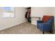 Bedroom with neutral carpet, window and closet with desk and arm chair at 1160 Ida Ct, Greenwood, IN 46143