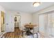 Bright dining area featuring a round table, four chairs and a beautiful area rug at 1160 Ida Ct, Greenwood, IN 46143