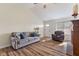 Inviting living room with hardwood floors and abundant natural light, perfect for relaxation and entertaining guests at 1160 Ida Ct, Greenwood, IN 46143