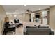 Finished basement living area with recessed lights, media center, and plush carpeting at 11629 Boothbay Ln, Fishers, IN 46037