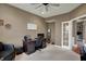 Functional home office with neutral walls, carpet and lots of space at 11629 Boothbay Ln, Fishers, IN 46037