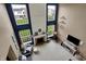 Living room features high ceilings, a fireplace and large windows for lots of natural light at 11629 Boothbay Ln, Fishers, IN 46037