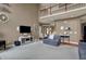 Open living room boasts a fireplace and a staircase to the second floor at 11629 Boothbay Ln, Fishers, IN 46037
