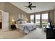 Serene main bedroom with natural light, a ceiling fan and neutral decor at 11629 Boothbay Ln, Fishers, IN 46037