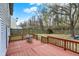 Outdoor deck with backyard and tree line view at 12198 Blue Springs Ln, Fishers, IN 46037
