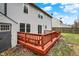 This shot showcases the backyard's wood deck, shed, and sliding glass doors at 12198 Blue Springs Ln, Fishers, IN 46037