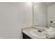 Clean bathroom featuring a white sink, a mirror, and fresh towels for a comfortable experience at 12198 Blue Springs Ln, Fishers, IN 46037