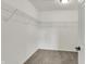 Walk-in closet featuring carpet and wire shelving for optimal storage at 12198 Blue Springs Ln, Fishers, IN 46037
