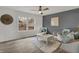 Bright living room with neutral walls, stylish furniture, and lots of natural light, creating an inviting space at 12198 Blue Springs Ln, Fishers, IN 46037
